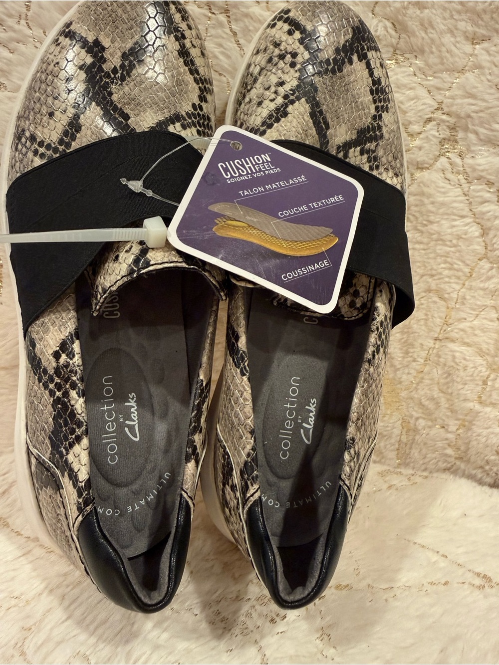 Clarks Snake-Print Slip-On Flats in Beige and Black